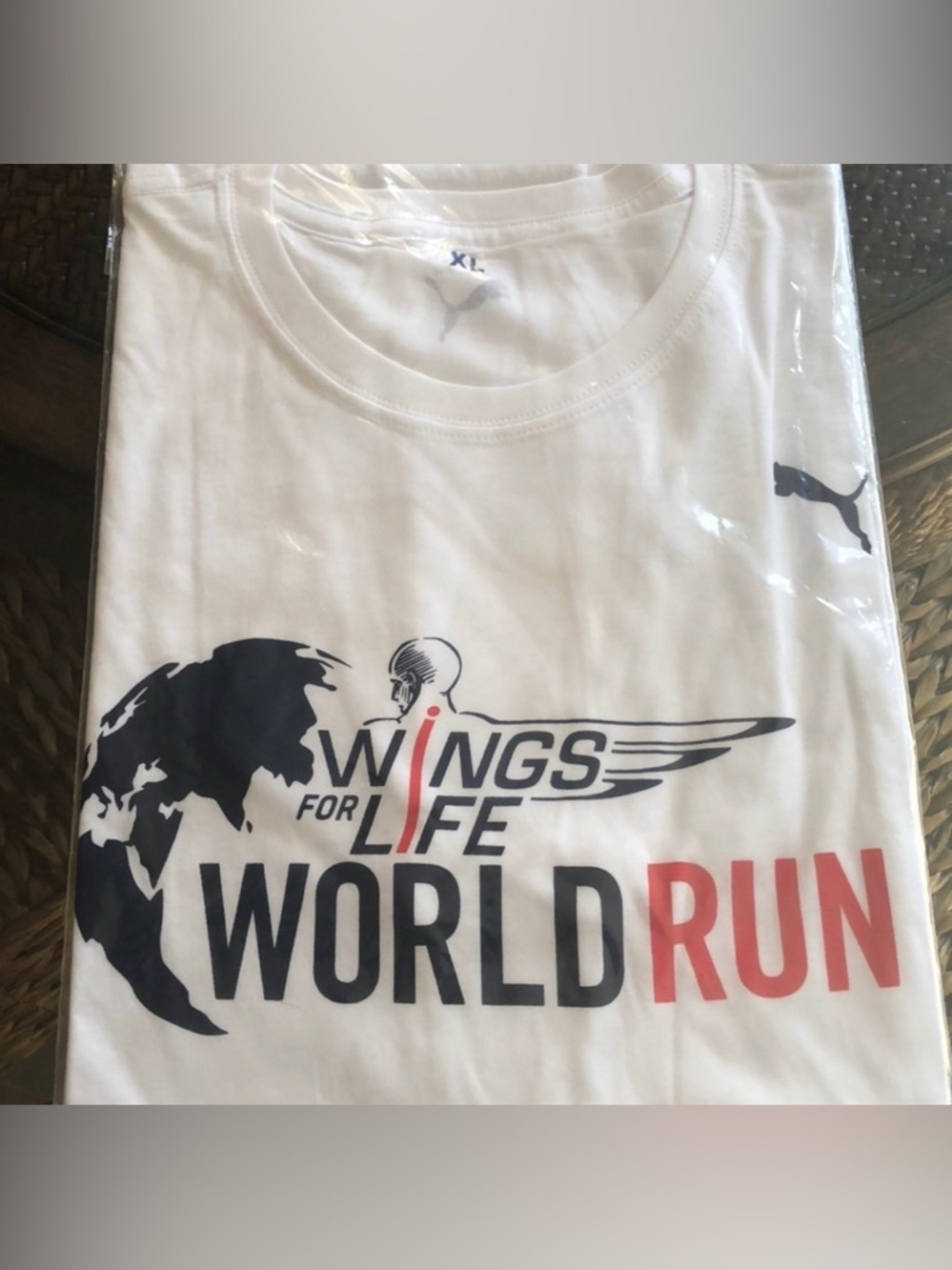 Puma Wings For Life World Run Short Sleeve T‑Shirt - White